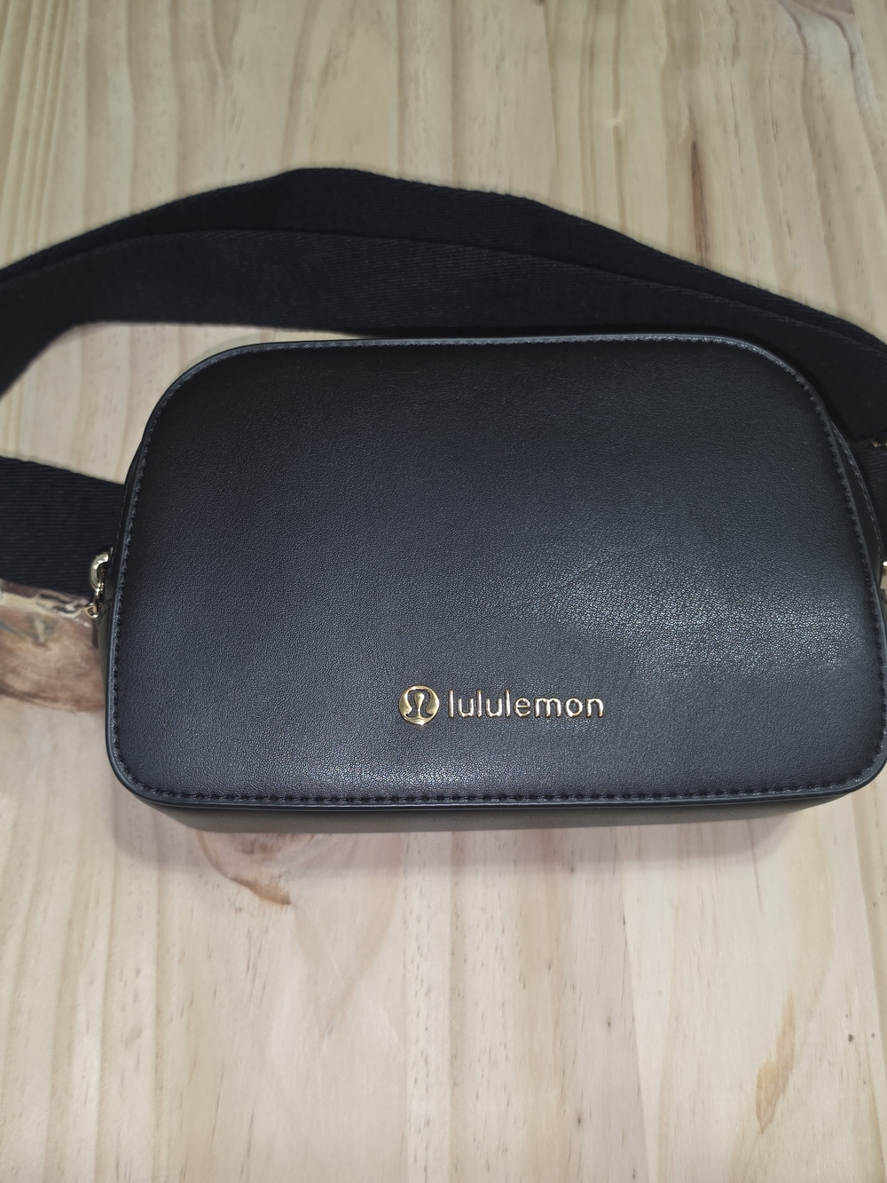 lululemon athletica Black Crossbody Bag with Gold Logo, Hard Sides, Leather